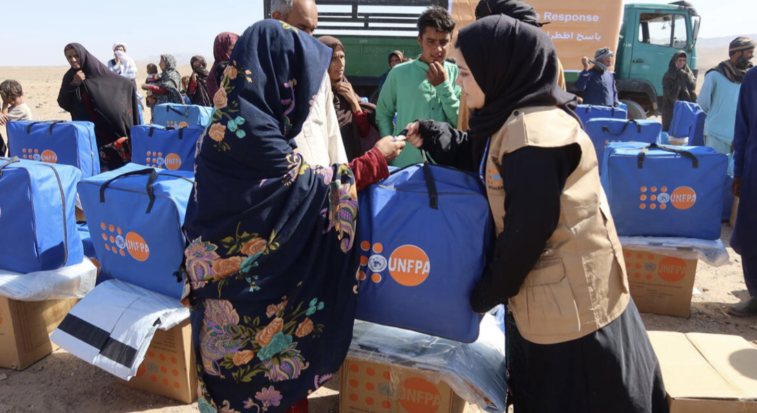 UNFPA distributed dignity kits, blankets and tarps immediately after the earthquake to help women and their children survive the cold as they are living in camps for displaced families.