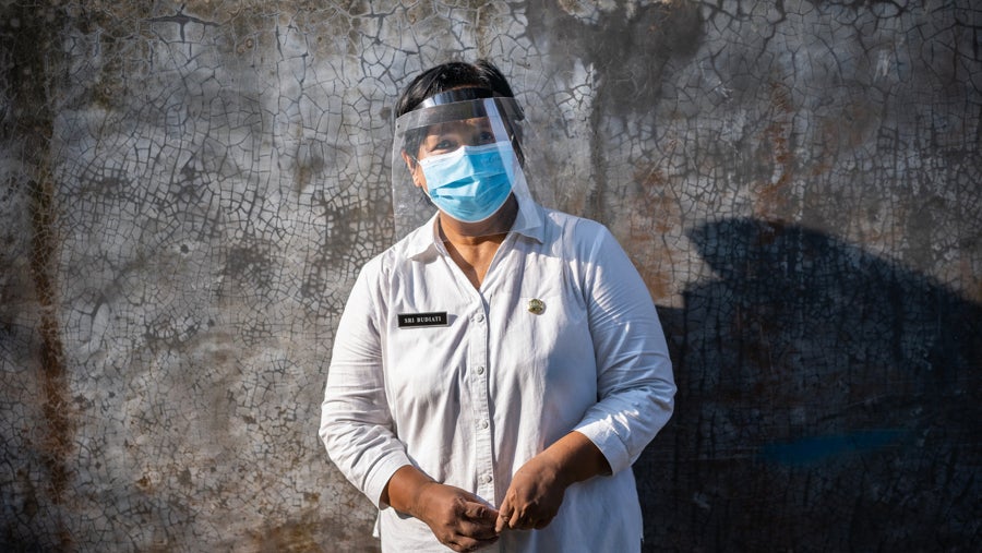 Midwife Sri Budiyati in Pandes village in Klaten, Central Java, Indonesia. UNI329147/Fauzan Ijazah 