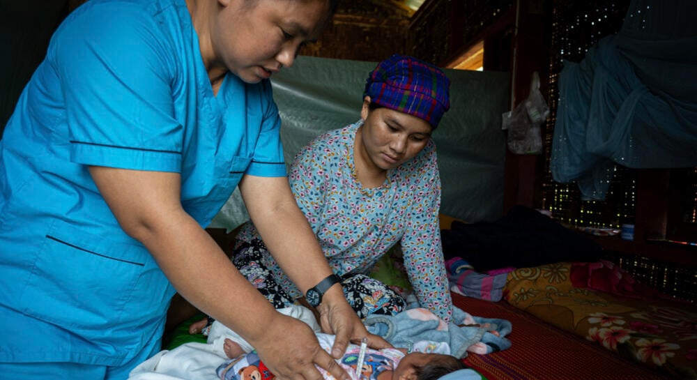 Lamawng is a midwife at a camp for internally displaced persons from Kachin, 