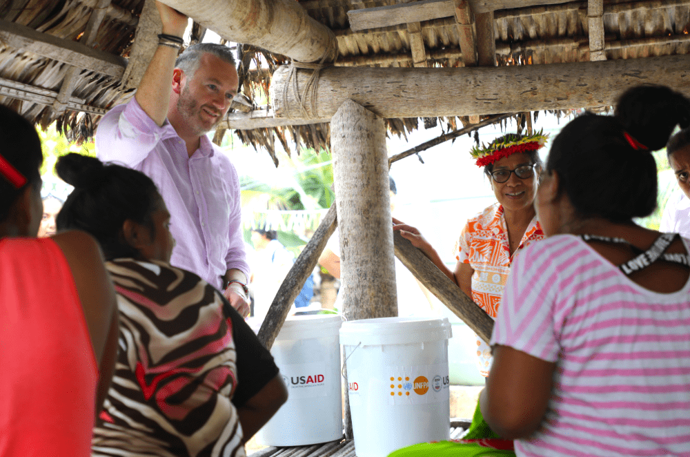 UNFPA Regional Director for Asia and the Pacific, Pio Smith, speaking with pregnant women at the local health clinic in Abaokoro, a remote village in North Kiribati. As a country located in the Pacific Ring of Fire, Kiribati is more prone to disasters (Photo: UNFPA/Randima Jayasinghe)