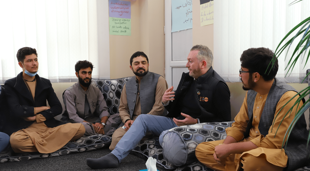 Pio Smith engaging with young boys in the Balkh Province of Afghanistan