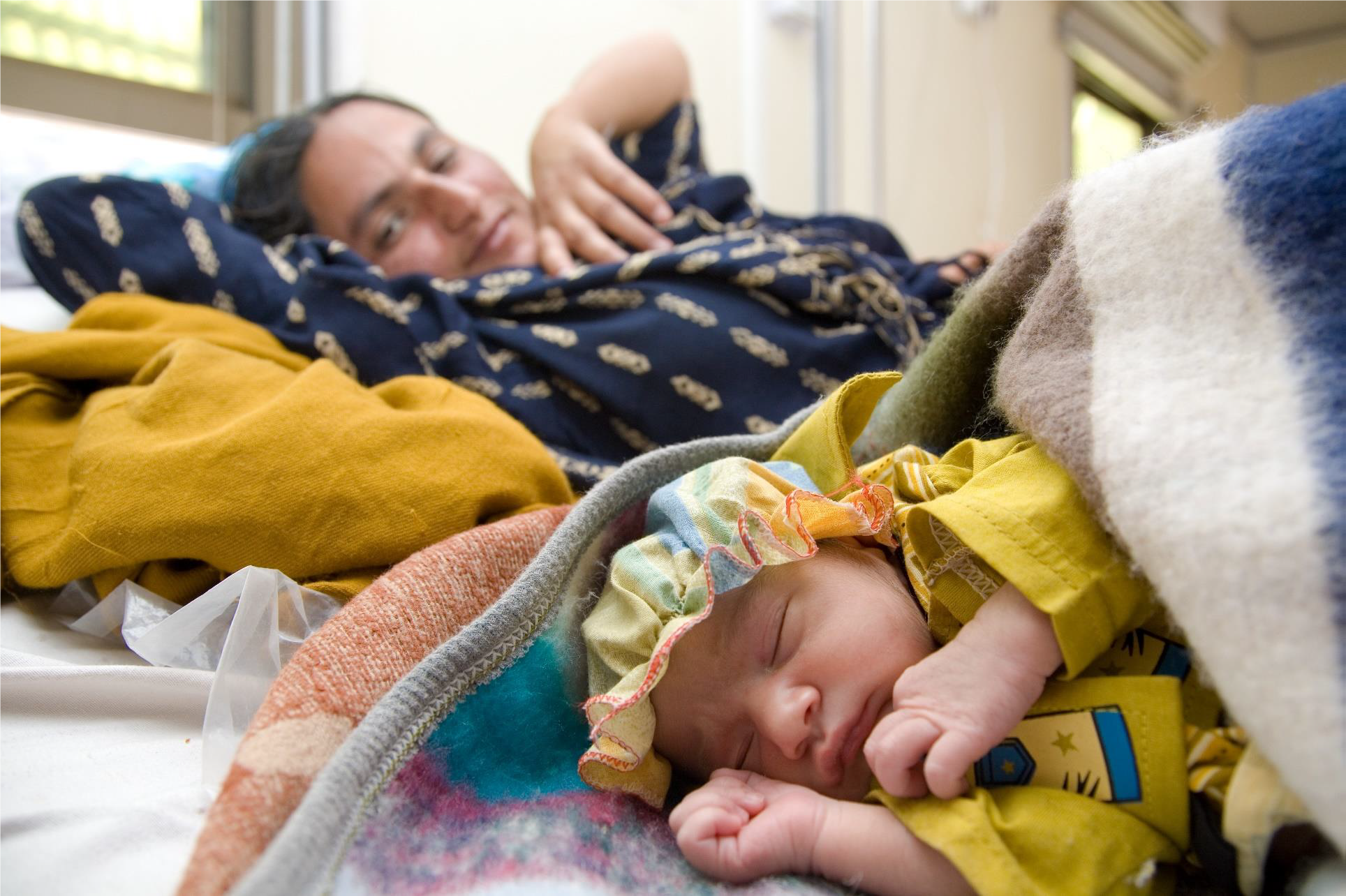 Photos Show a Woman Trying a Home Birth Amid COVID-19 Pandemic