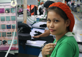 Mae Esparcia an employee at Hamlin's garments factory.  (Photo by UNFPA Philippines) Mae Esparcia, an employee at Hamlin's garments factory in Cavite, the Philippines is now better to her family and life.  (Photo by UNFPA)