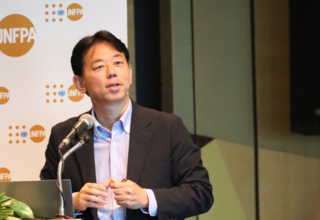 A photo of Dr Rintaro Mori speaking at a UNFPA event