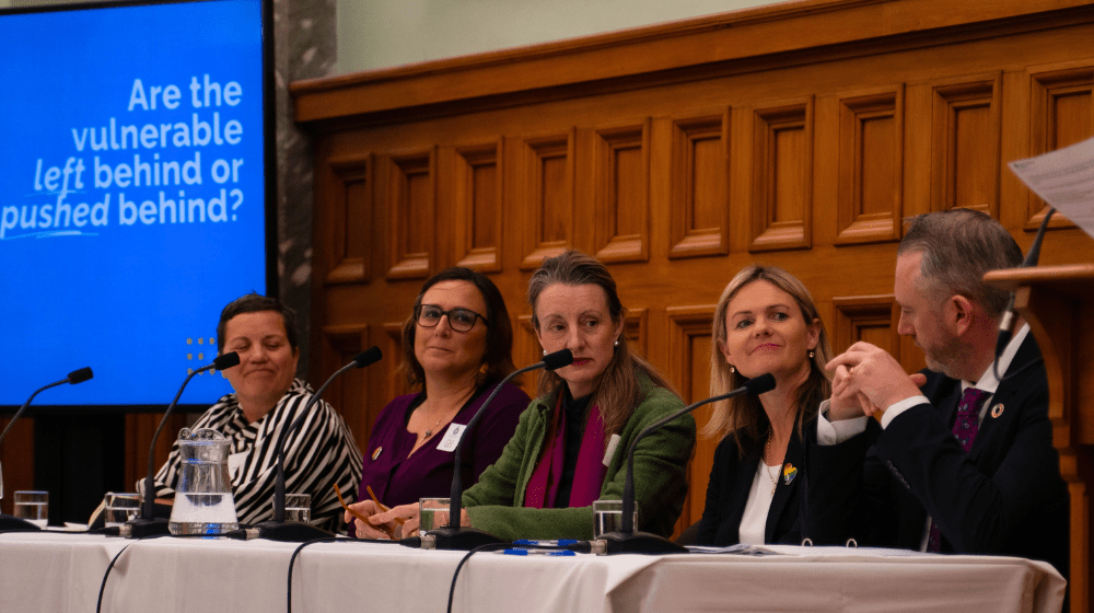 A photo of the panel members at the report launch in Wellington