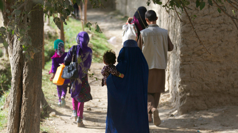 Photo of a family in Afghanistan in their village