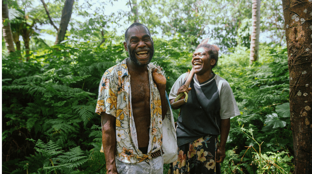 Lily Iawantak and her partner Kasi share a laugh at their village home on Tanna Island, Vanuatu.