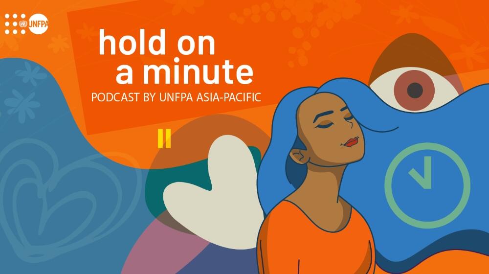  ‘Hold on a minute’ banner, a blue hair woman with her eye closed(cartoon).