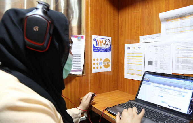 A Youth Health Line counsellor provides guidance on health issues, including child marriage, to young people in Afghanistan | Image: Zaeem Abdul Rahman/UNFPA Afghanistan