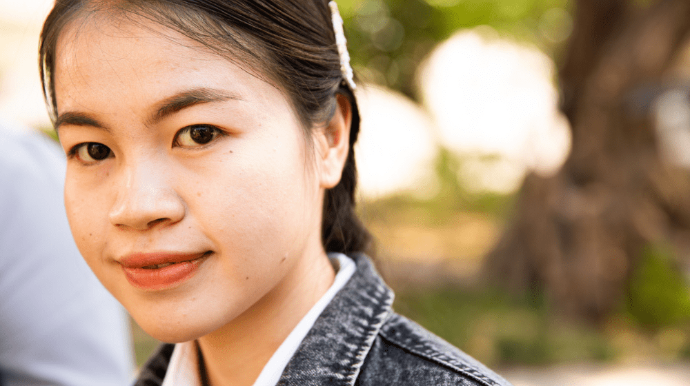 A portrait photo of a young girl from Laos