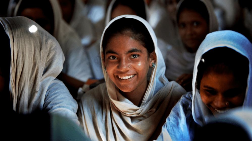 A photo of a smiling school girl 