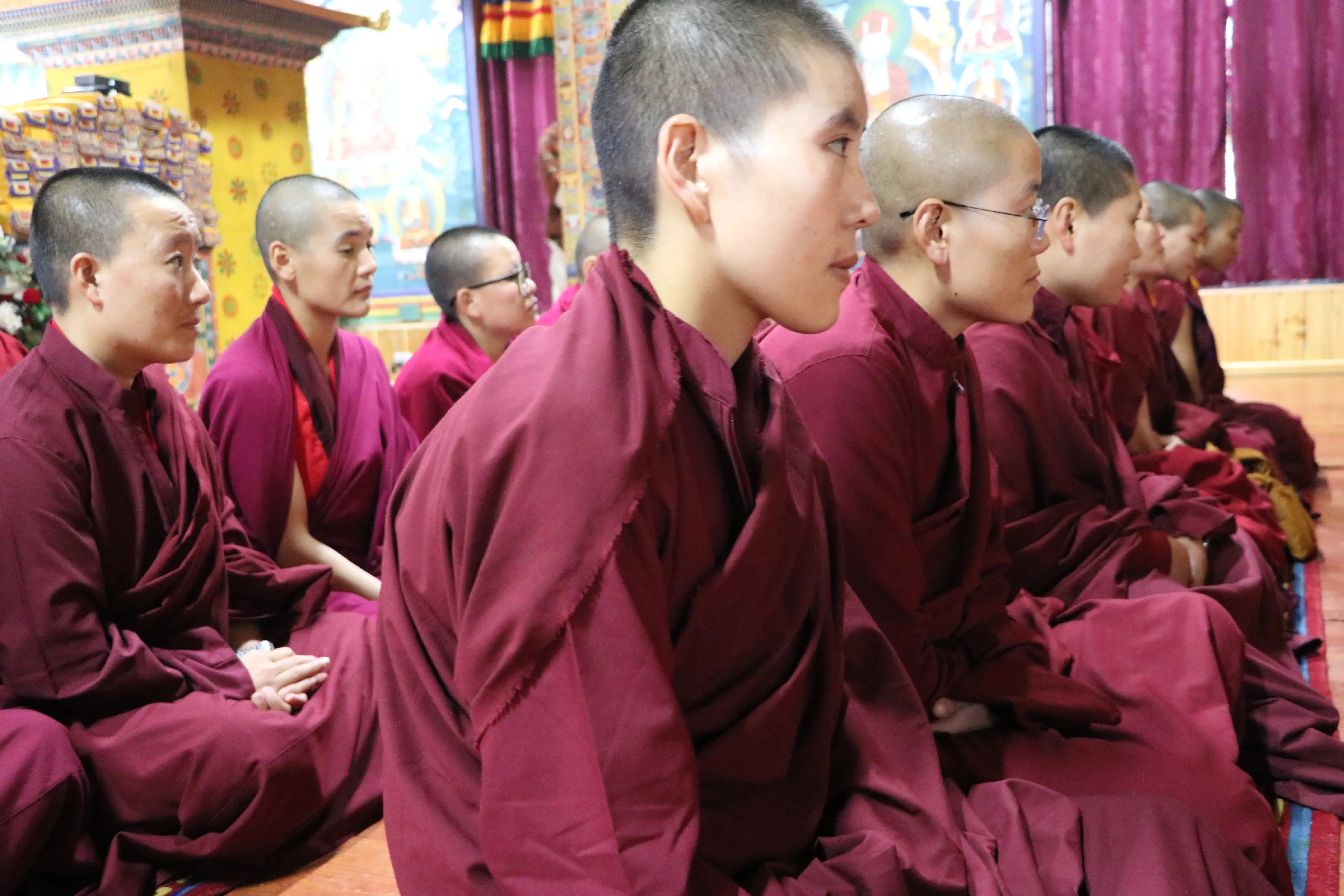 Changemakers in crimson robes