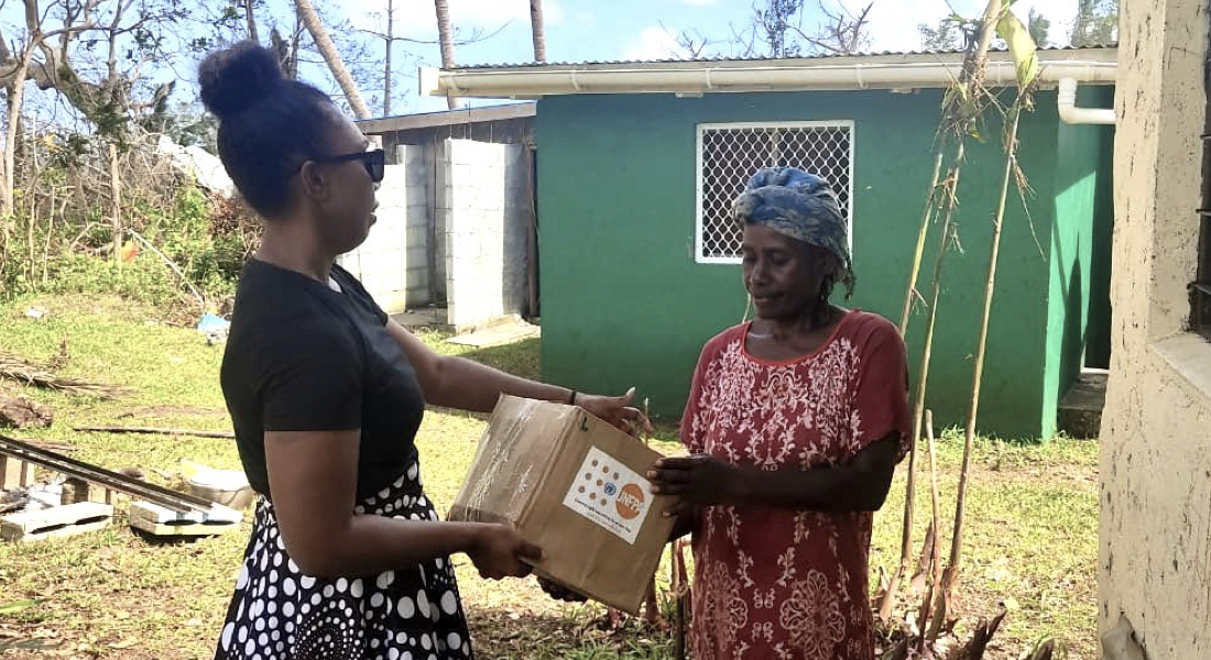 Sherol George (left) is from the Vanuatu Skills Partnership, a UNFPA partner who has helped the Vanuatu Society for People with Disability check on their registered clients and distribute Dignity Kits. ©UNFPA Pacific